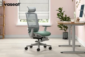 A stunning green cushioned gray back SM6 ergonomic chair in a home office