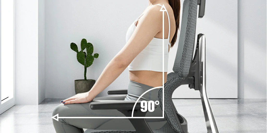 woman sitting on chair with leg extended, demonstrating chair's ergonomic features