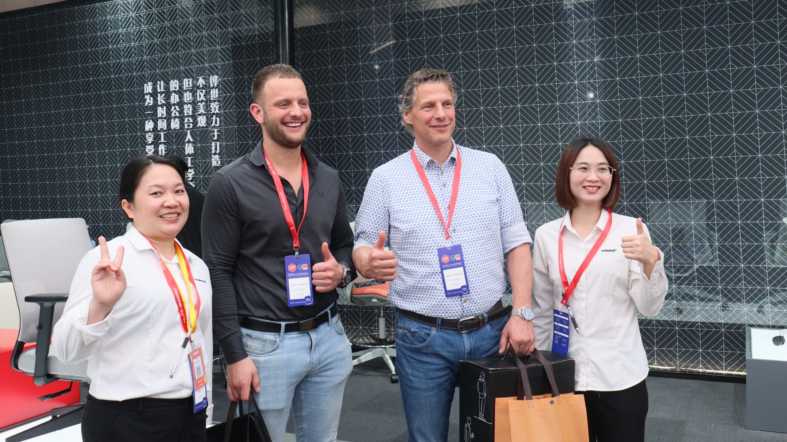 International buyers discussing partnership with Vaseat at CIFF Guangzhou 2025